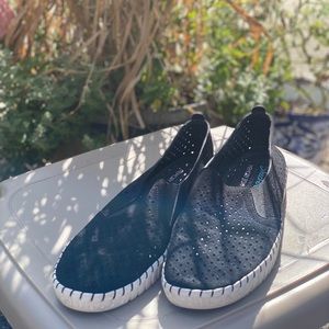Women’s black Skechers